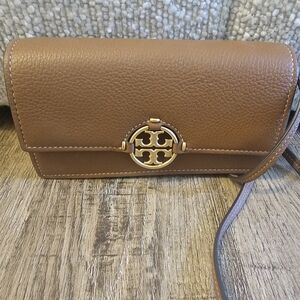- Tory Burch leather crossbody bag